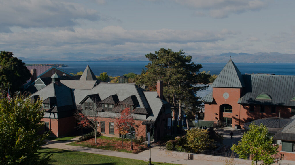 view of campus with Lake Champlain and mountains in the background